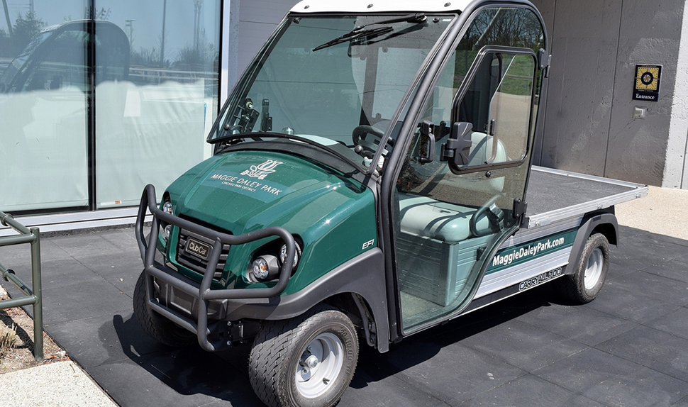 golf cart delivering lawn care materials