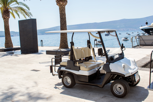 golf cart parked on dock