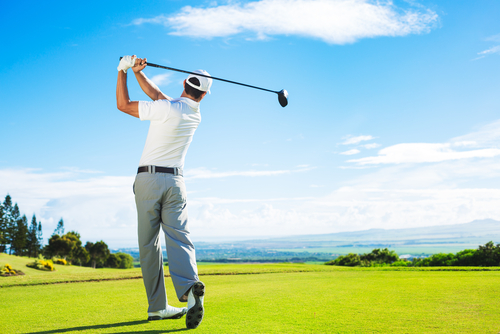 man-playing-golf-on-beautiful-sunny-day