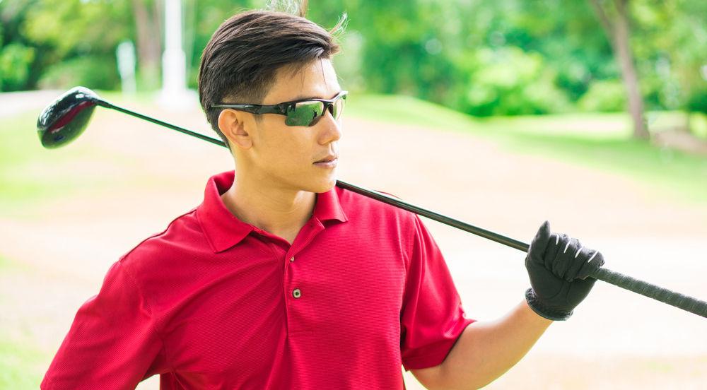 profile-golfer-sunglasses-outdoors