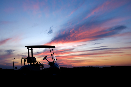 silhouette-golf-cart-course-colorful-twilight